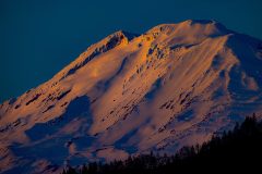 yellow blue snow covered mountain top